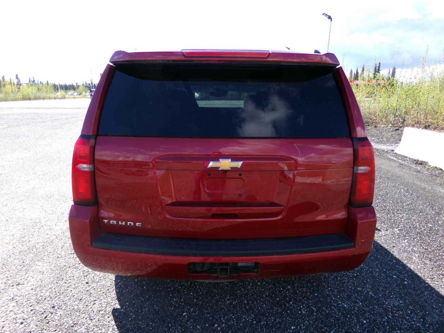 2015 Red Chevrolet Tahoe LT 4WD (1GNSKBKC8FR) with an 5.3L V8 OHV 16V engine, 6-Speed Automatic transmission, located at 2630 Philips Field Rd., Fairbanks, AK, 99709, (907) 458-0593, 64.848068, -147.780609 - Photo#3